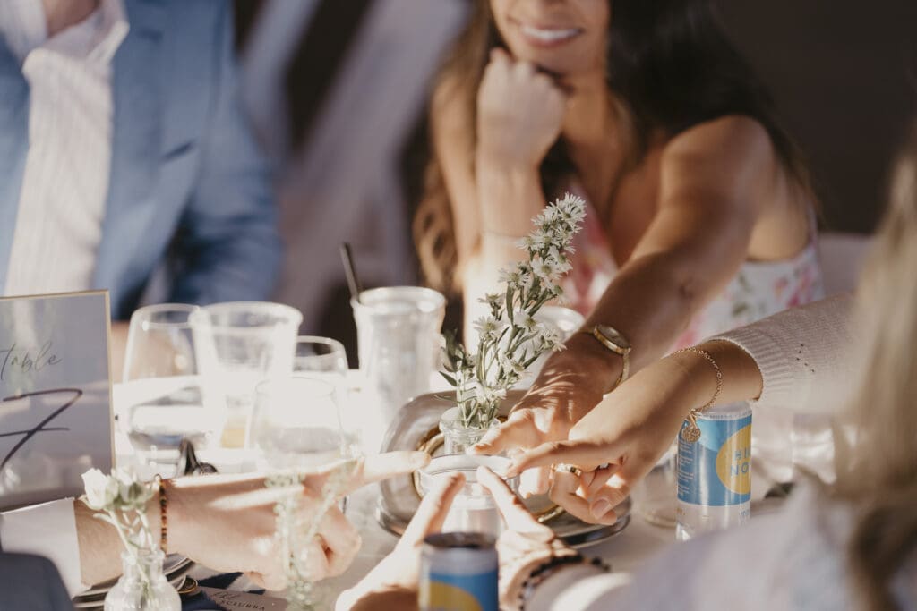 Wedding guests sitting at a table at a Maryland wedding ceremony
