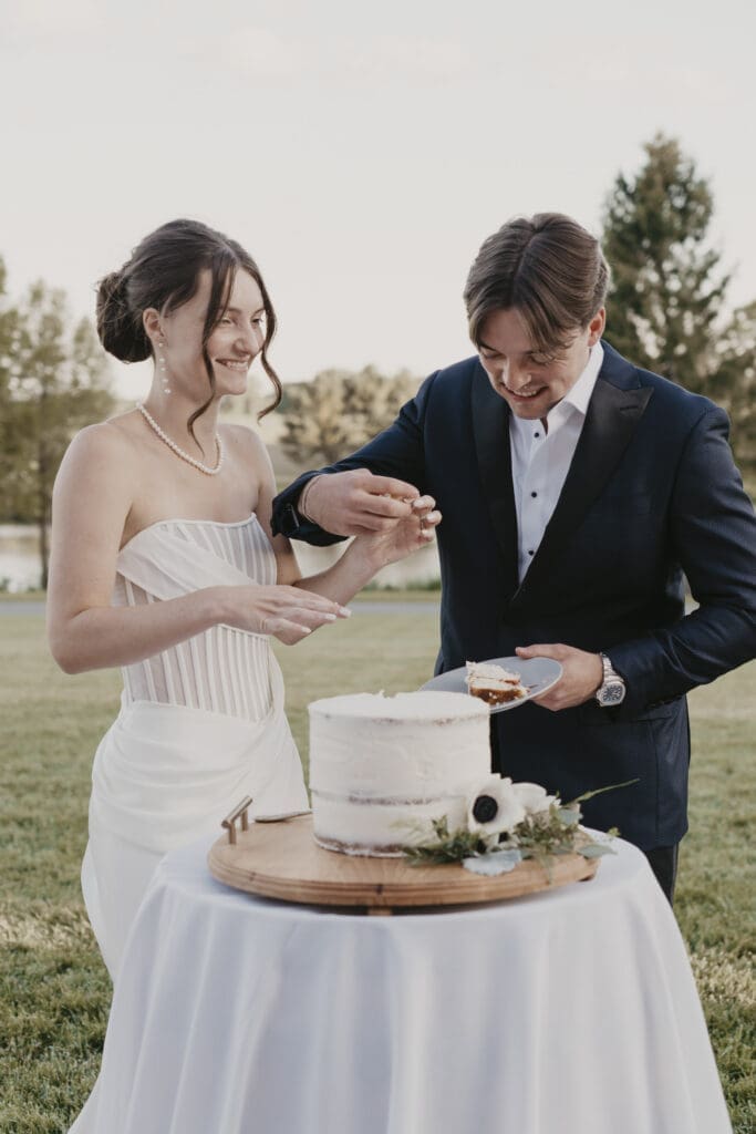 Cutting the cake at Bortner Valley wedding