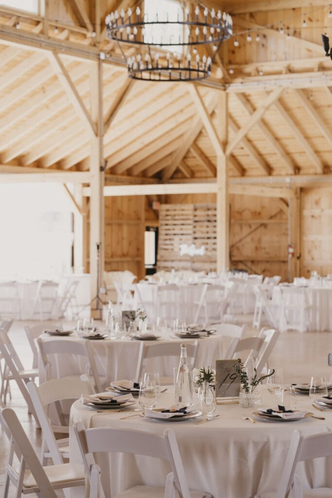 Bortner Valley wedding reception tables inside barn